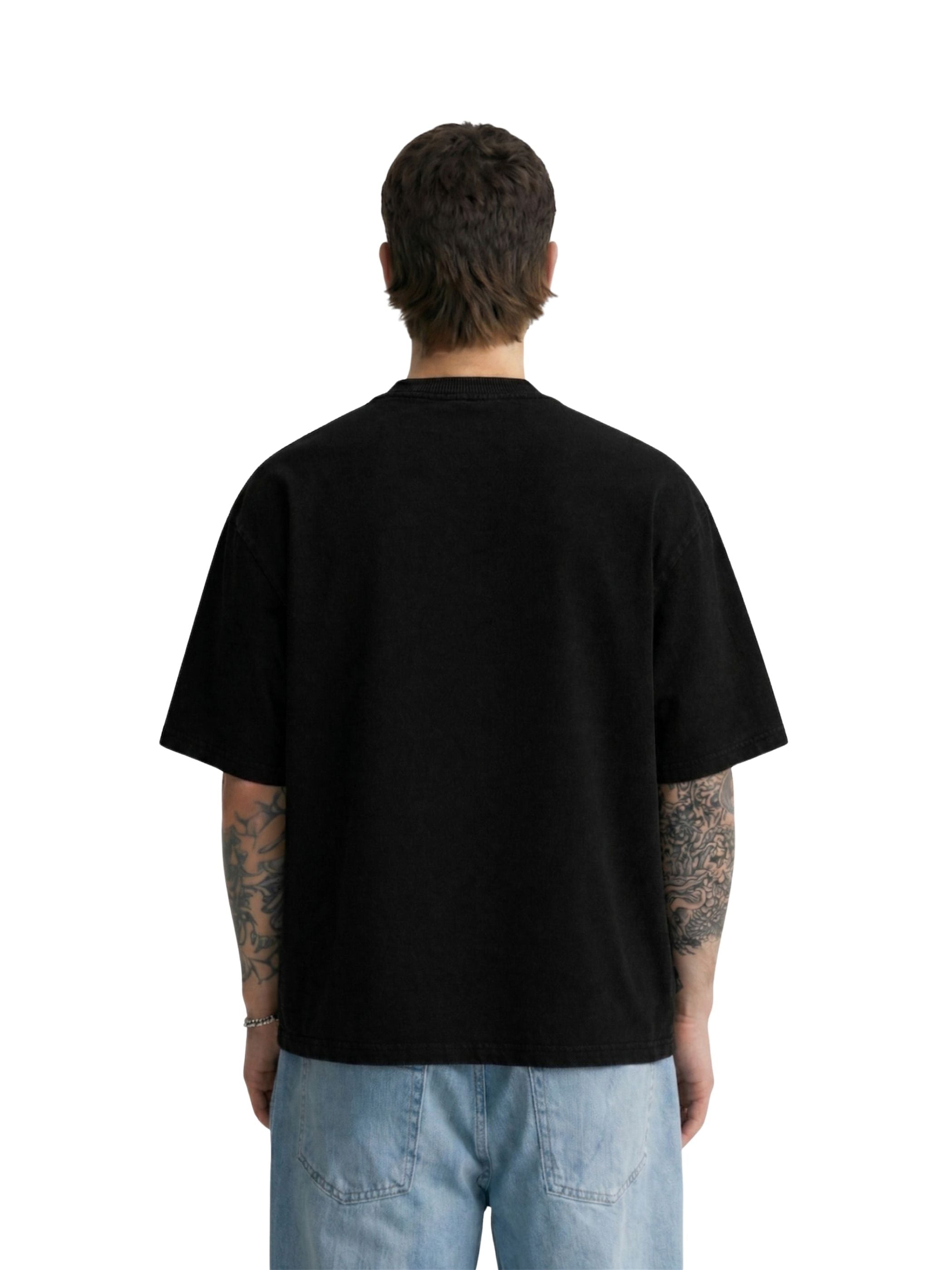 model wearing theory basic boxy fit tee from behind 