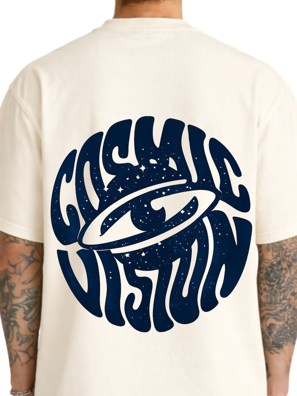 Model wearing The Cosmic Vision cream boxy fit T-shirt with large navy back graphic