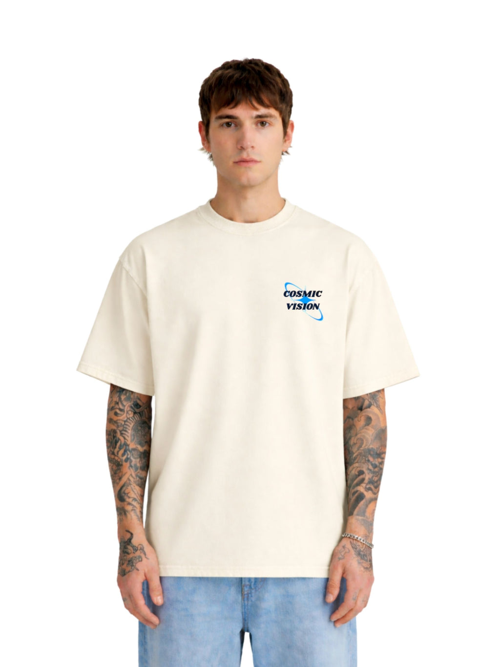 Model wearing The Cosmic Vision cream boxy fit T-shirt with small navy front graphic