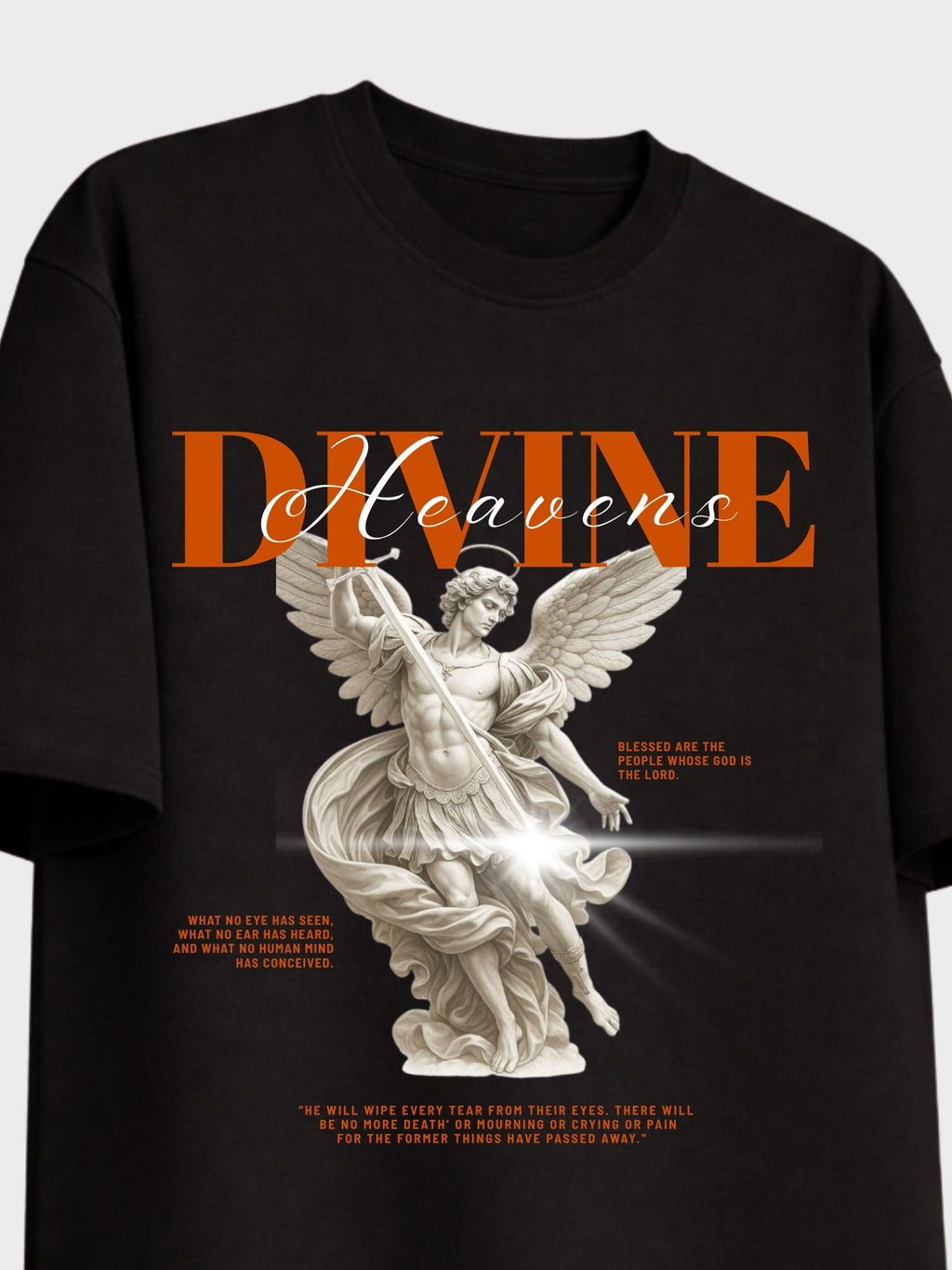 A black short-sleeve graphic T-shirt featuring a large front print with the word 'Divine' in orange and white script over an angel statue illustration, shown on a light gray background.