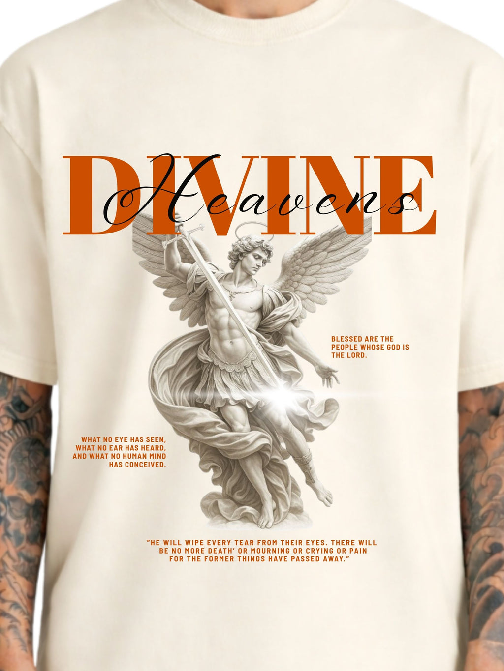 Close-up of Divine Heaven off-white boxy fit T-shirt with angel illustration and orange typography