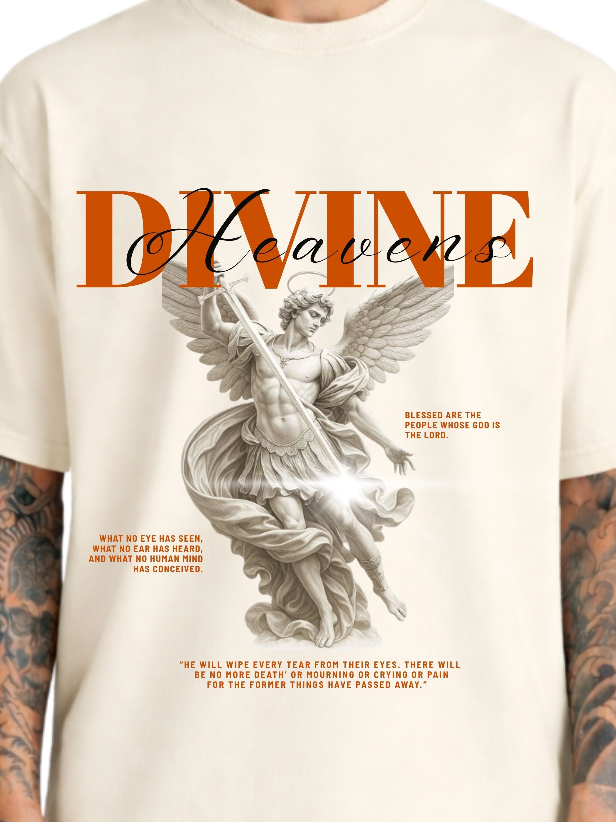 Close-up of Divine Heaven off-white boxy fit T-shirt with angel illustration and orange typography