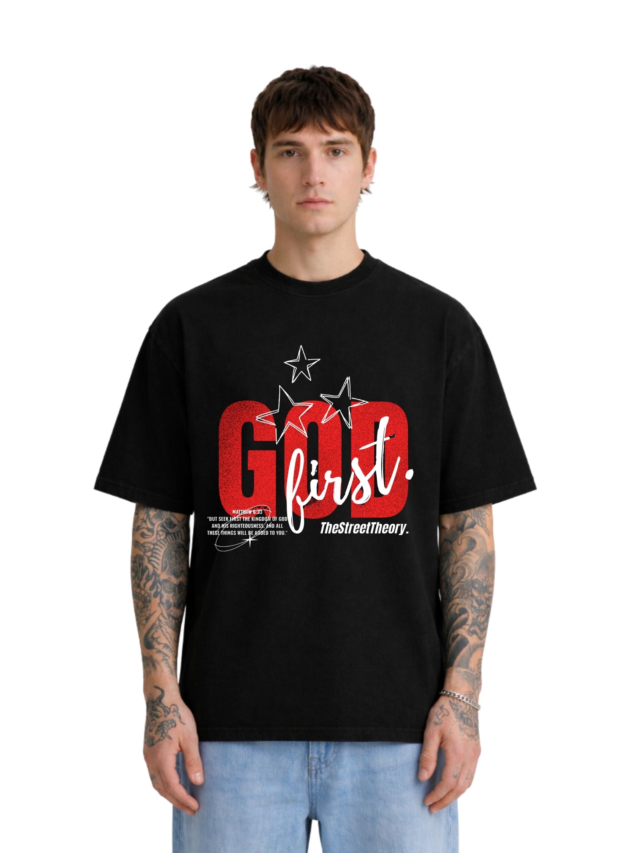 Model wearing God First black boxy fit T-shirt with red front graphic