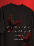 A black t-shirt featuring two red and black eagle illustrations and a white quote printed on the front, set against a solid red background.