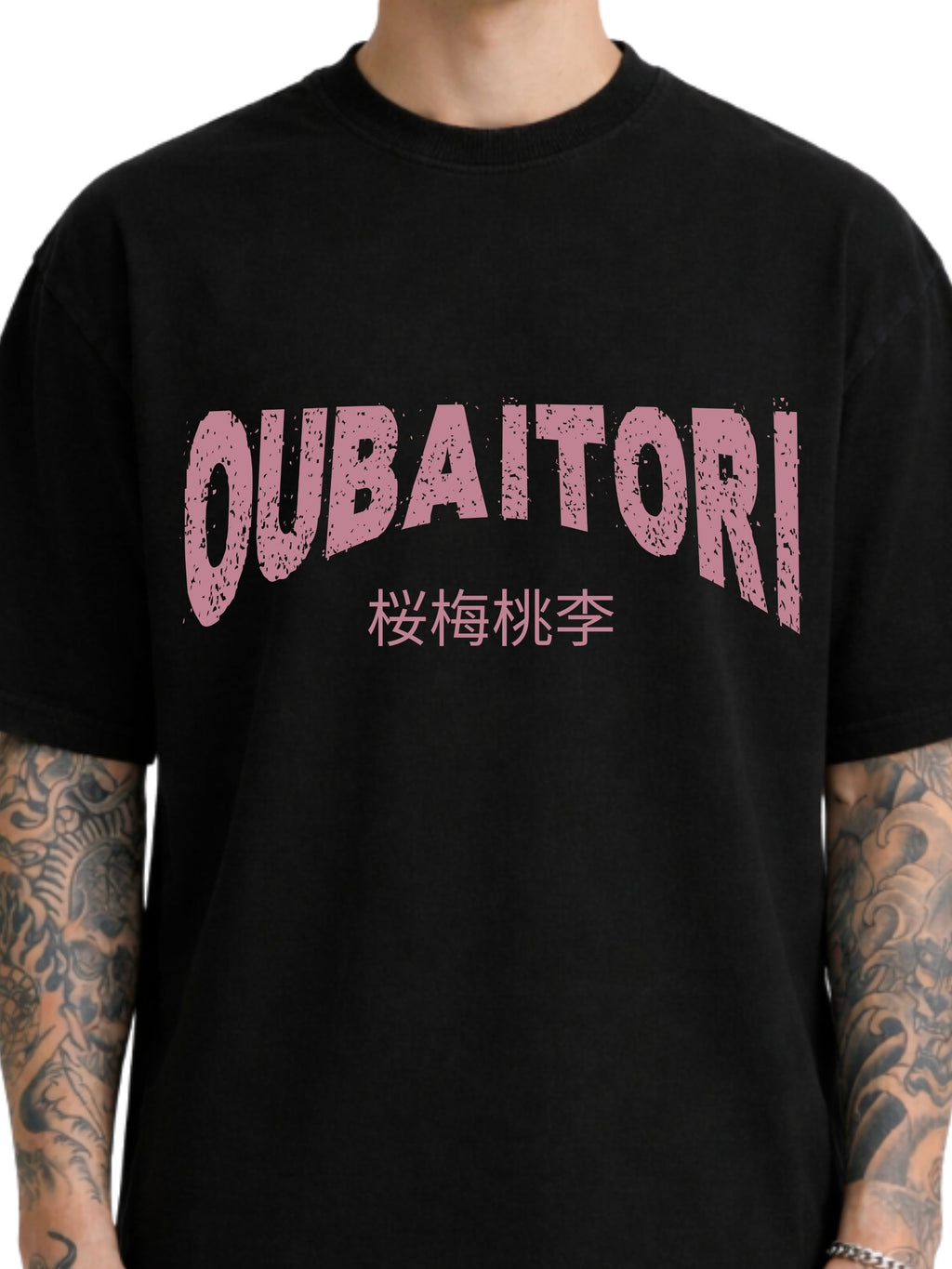 A black short-sleeve t-shirt with a distressed pink graphic on the chest reading 'OUBAITORI' and Japanese characters underneath, shown on a model.