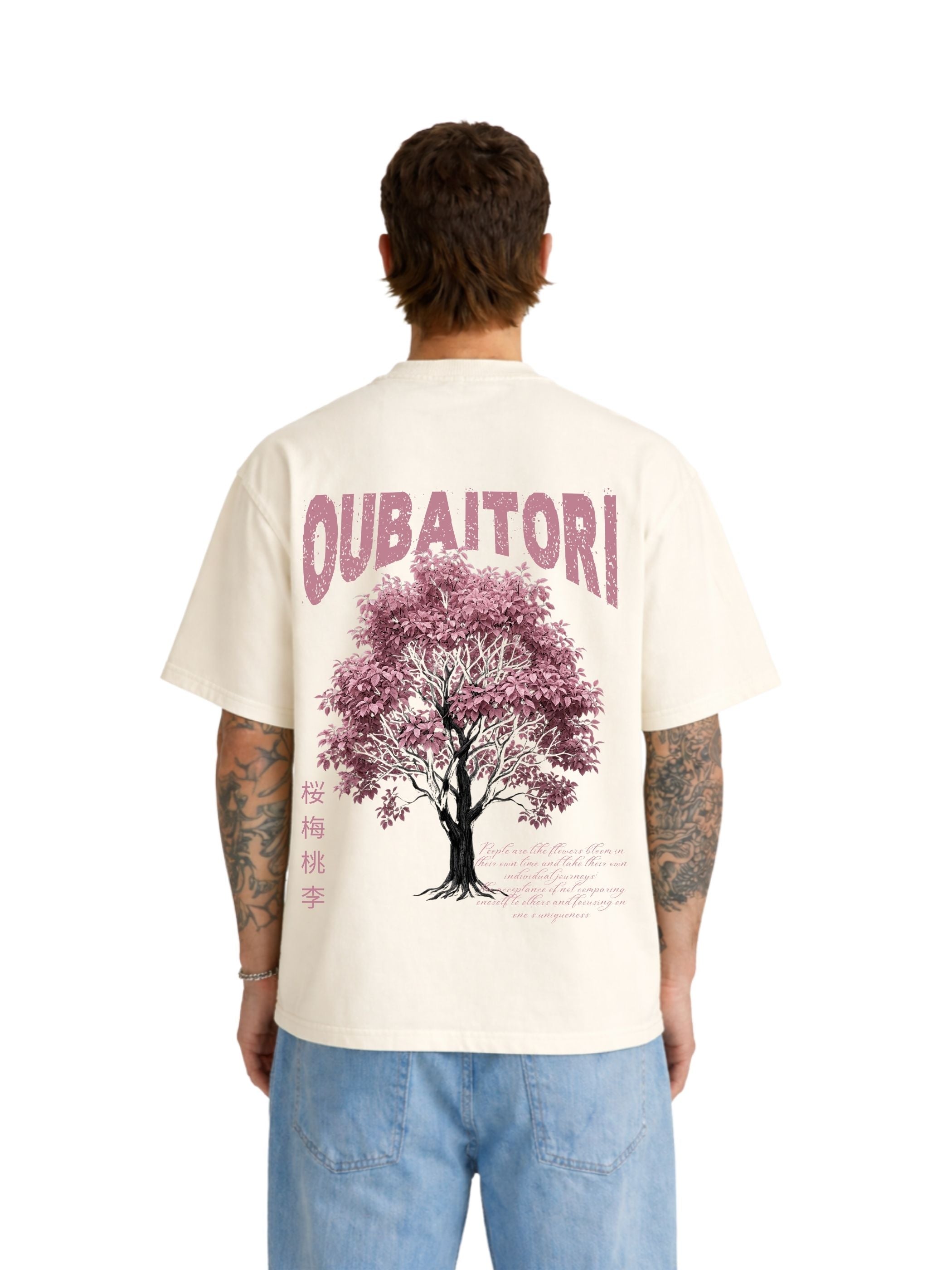 Model wearing Oubaitori off-white boxy fit T-shirt with pink tree graphic on back